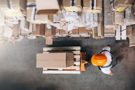 young-man-working-warehouse-with-boxes (2)