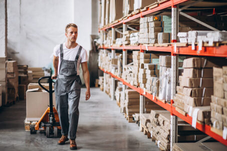 young-man-working-warehouse-with-boxes (3)